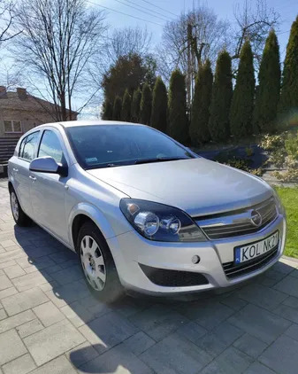 samochody osobowe Opel Astra cena 10500 przebieg: 196000, rok produkcji 2010 z Olkusz